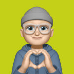 Stubot Memoji - making a heart shape with his hands.