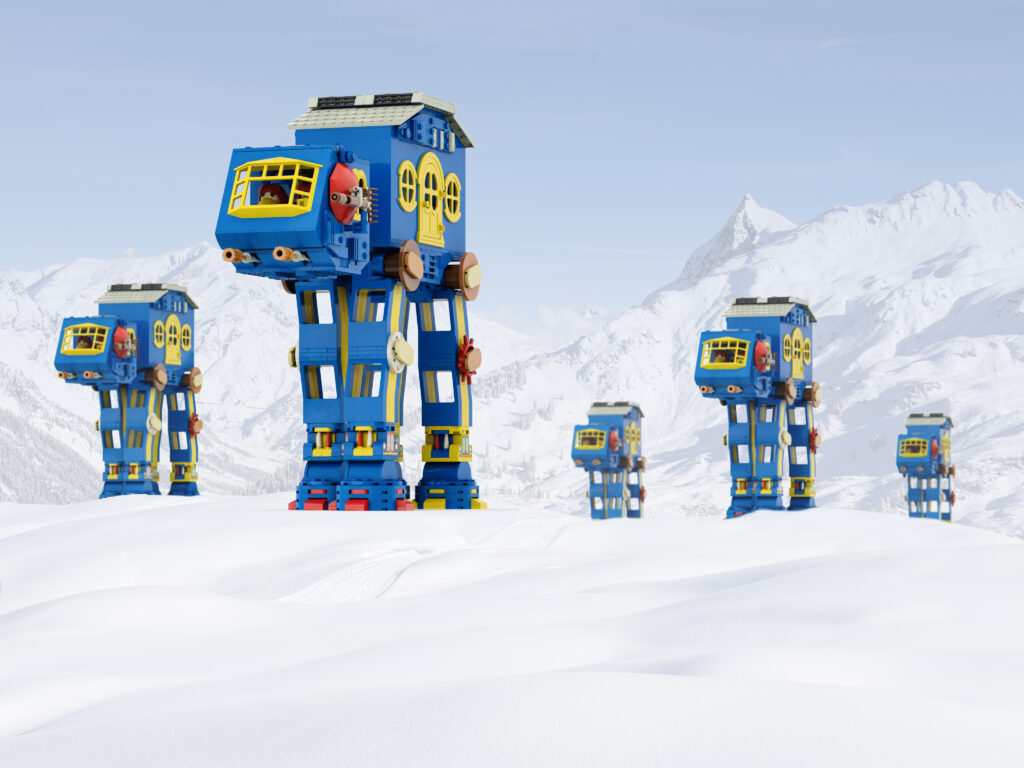 Four imperial walkers approaching over a snowy terrain.
