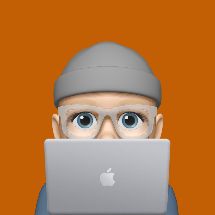 Stewart's Memoji avatar - he's wearing a woolly hat and thick-rimmed glasses, hiding behind a MacBook.