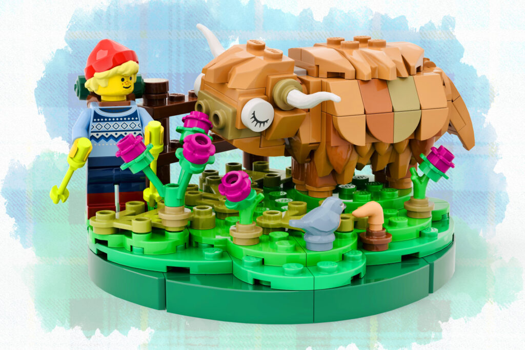 A LEGO minifigure in a red cap stands beside a shaggy tan horned cow on a small grassy display base with pink flowers, a bird, and a tiny mushroom.